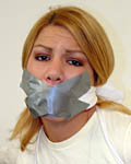 Stuffed cleave gag with layered tape gag with detective gag with X-ed tape gag