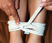 Cinch The Rope.                      copyright bondage-babylon.com